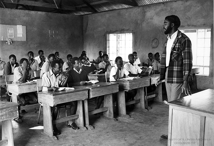 Leon Dash teaching high school students in Kenya