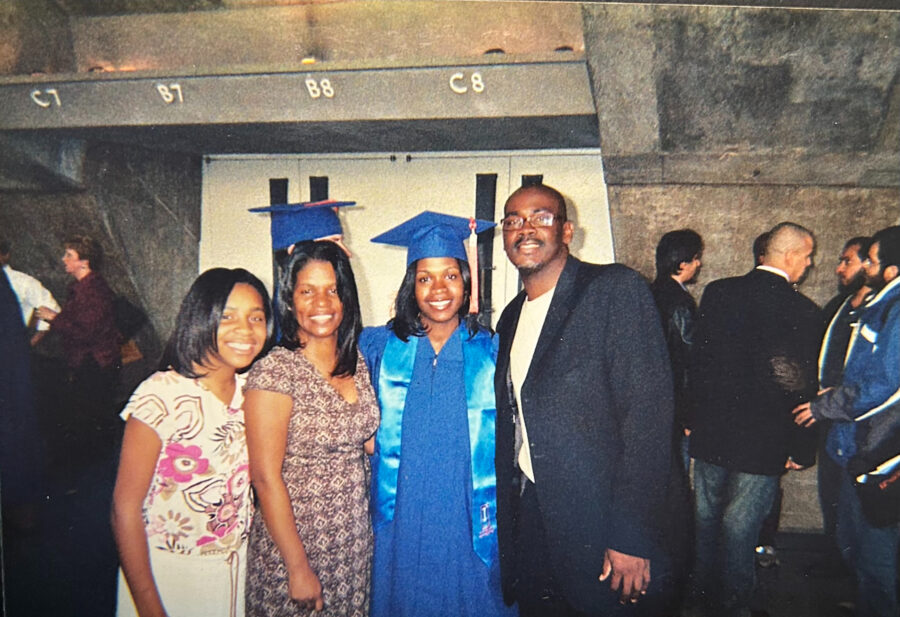 Dowdy poses with her sister, far left, mother, and father on graduation day in 2006. 